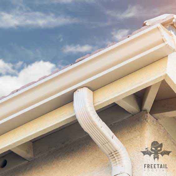 How do I maintain my gutters?